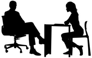 Man and Woman at Desk